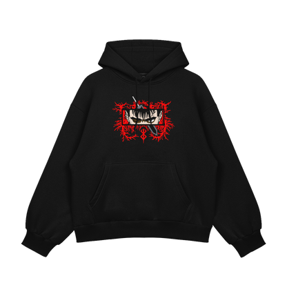 Guts Embroidered Oversized Hoodie featuring bold red embroidery on a black fleece background.